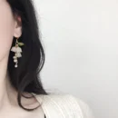 2023 New Sweet Temperament Small Fresh Bamboo White Lily Of The Valley Flower Earrings Elegant And Gentle Asymmetric Earrings